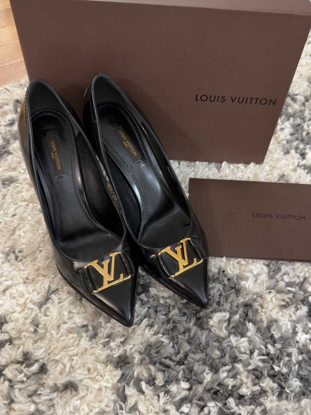 Authentic Louis Vuitton Black Pointed Toe Pumps with Gold LV Logo